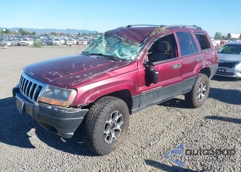 2000 Jeep Grand Cherokee Laredo from USA, damaged, VIN 1J4GW48S3YC123936